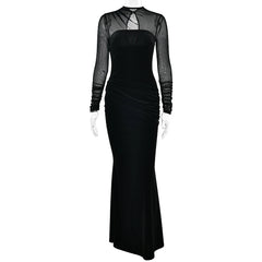 Black evening gown with sheer long sleeves on a white background