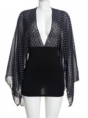 Polka dot v-neck flare sleeve mini dress on mannequin
