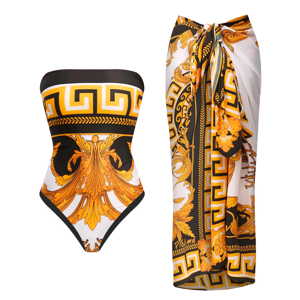 Strapless one-piece swimsuit with Greek key medallion print and coordinating sarong.