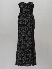 Black lace strapless gown on a light gray background