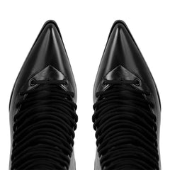 Top view of pointed toe on lace-up knee-high boots