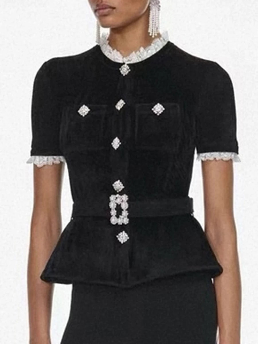 Black peplum top with white lace details