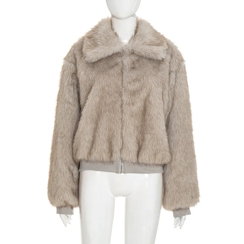 Beige faux fur jacket on a mannequin