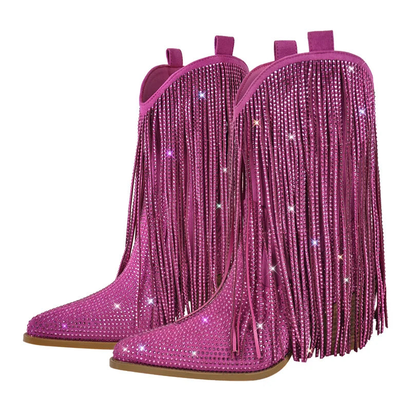 Pink fringed boots with rhinestones on a white background