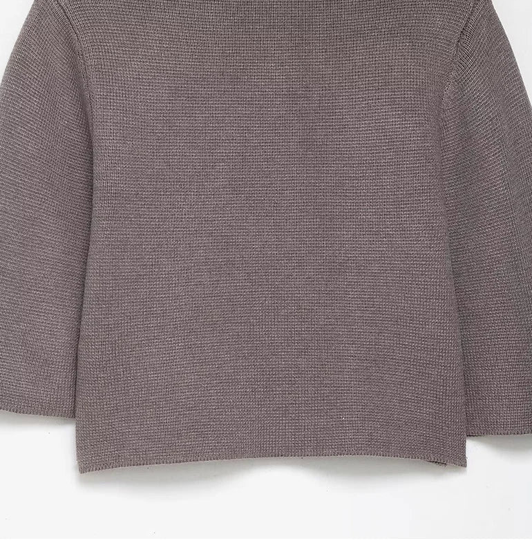 Close-up of a textured brown fabric on a white background