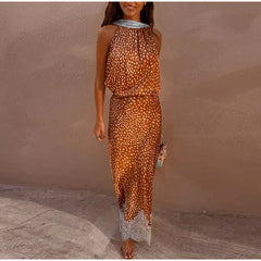 Full view of the polka dot print halter top and lace trim maxi skirt set