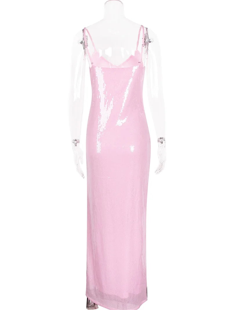 Pink slip dress on a mannequin against a white background