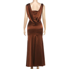 Brown evening gown on a mannequin against a white background