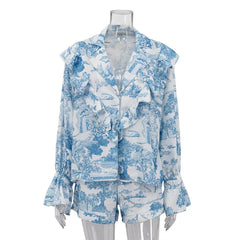 Blue and white patterned shirt on a mannequin against a white background