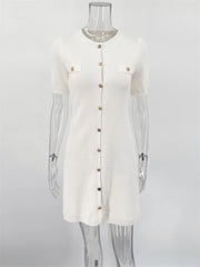 White cardigan with sheer sleeves on a mannequin against a white background