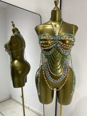 Multi-layer beaded body chain swimwear set with cascading strands in green and pastel tones.