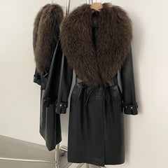 Long black faux leather belted coat with a rich brown fur collar.