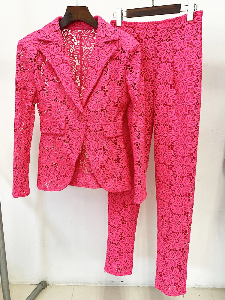Rose pink Guipure lace blazer and pencil pants suit displayed on hangers