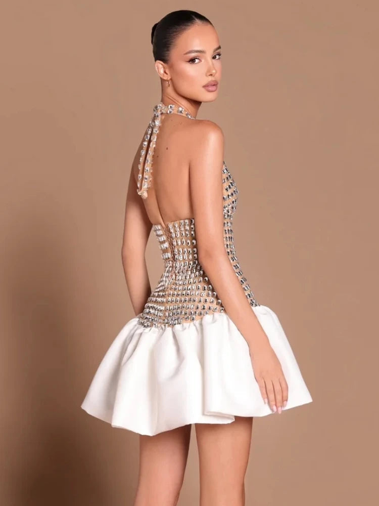 Crystal embellished halter neck mini dress with white voluminous skirt, back view