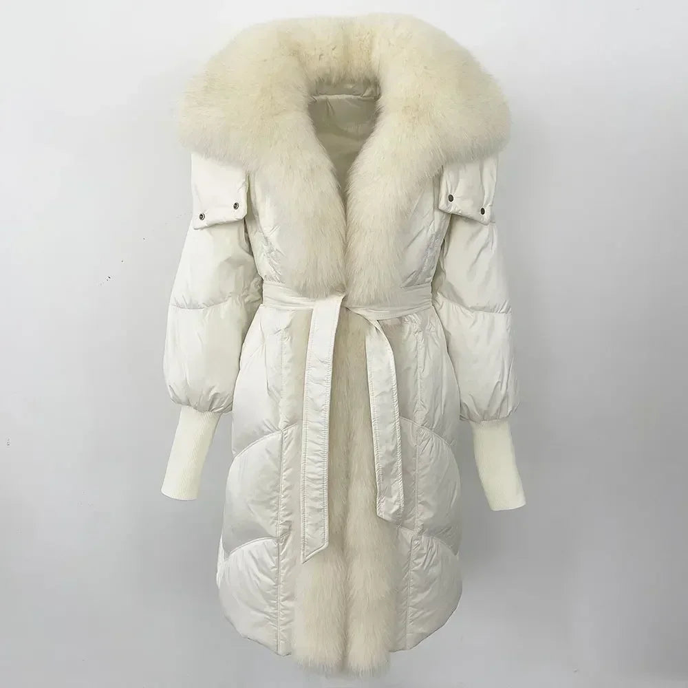 White puffer coat with a fur-lined hood on a white background
