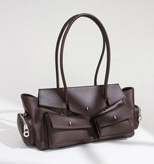 Brown handbag with multiple pockets and zippers on a white background
