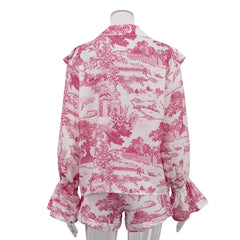 Pink and white patterned blouse on a mannequin against a white background