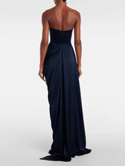 Navy strapless gown on a white background