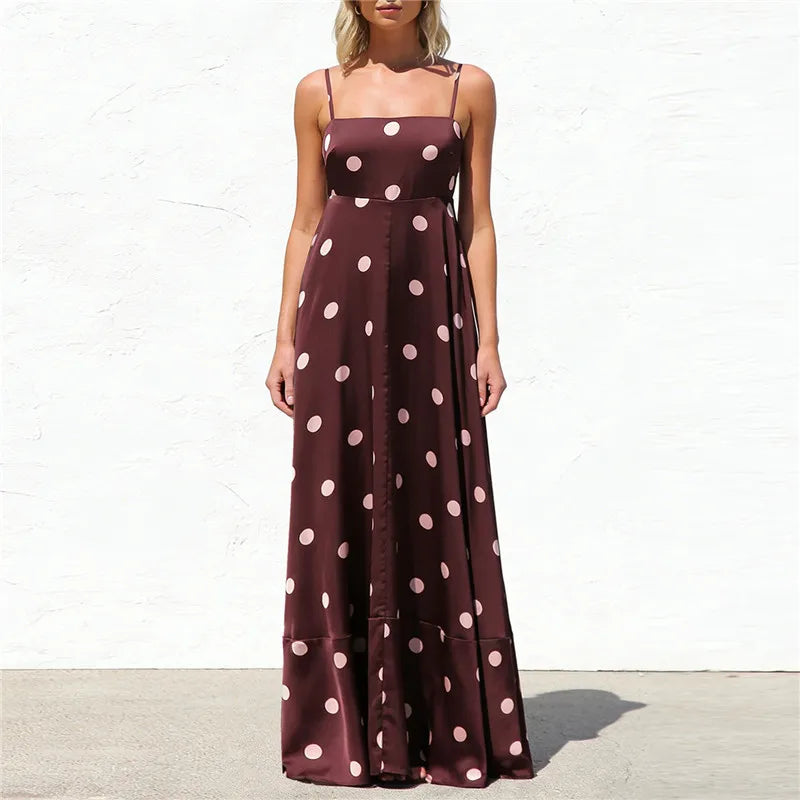 Front view of a polka dot satin maxi dress