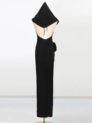 Black hooded dress on a mannequin against a white background