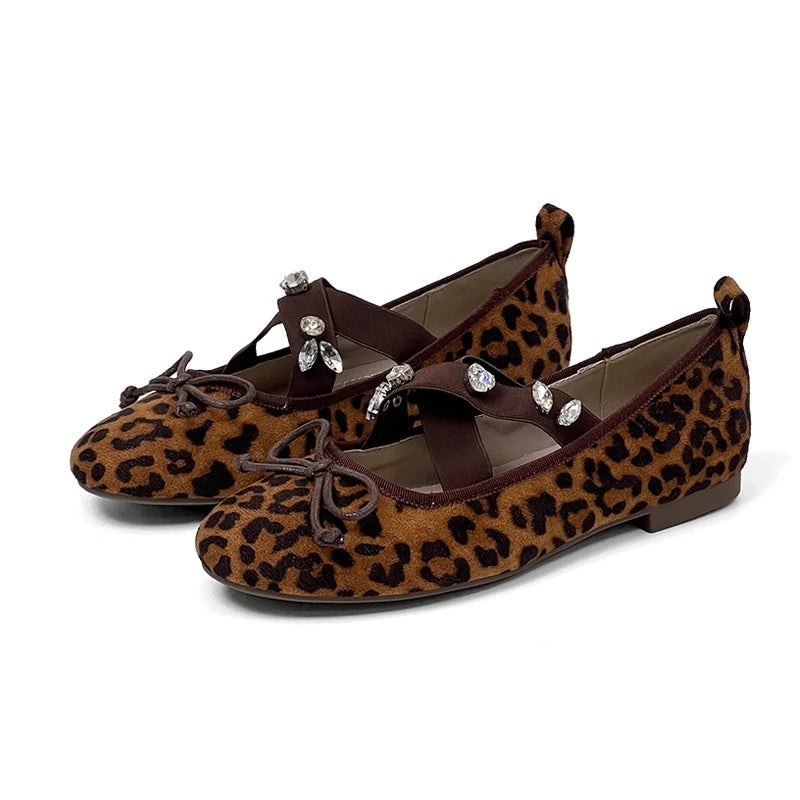 Leopard print Mary Jane flats with crystal embellished crisscross straps