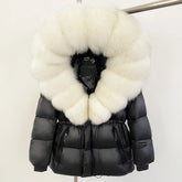 Hooded down jacket with a large white fur trim.