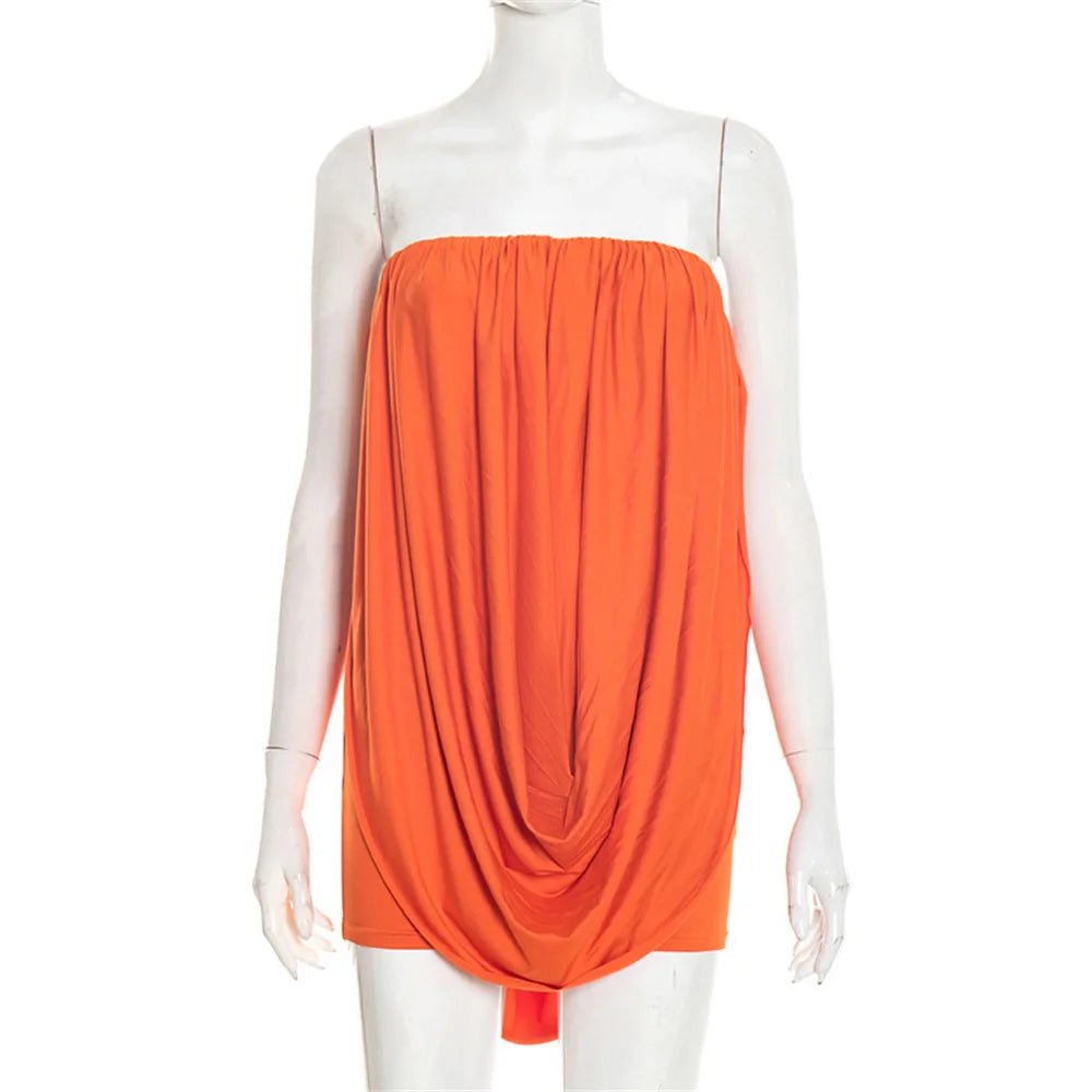 Orange dress on a mannequin against a white background