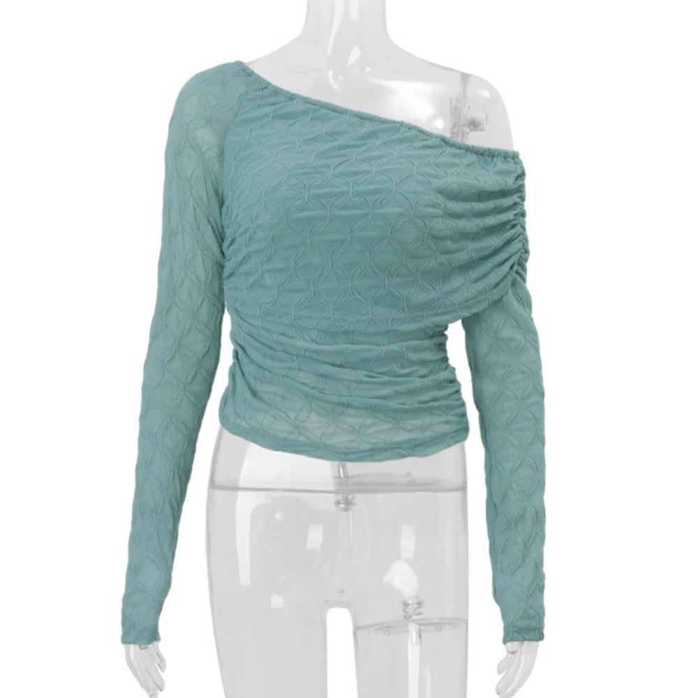 Teal off-shoulder long-sleeve top on a mannequin against a white background