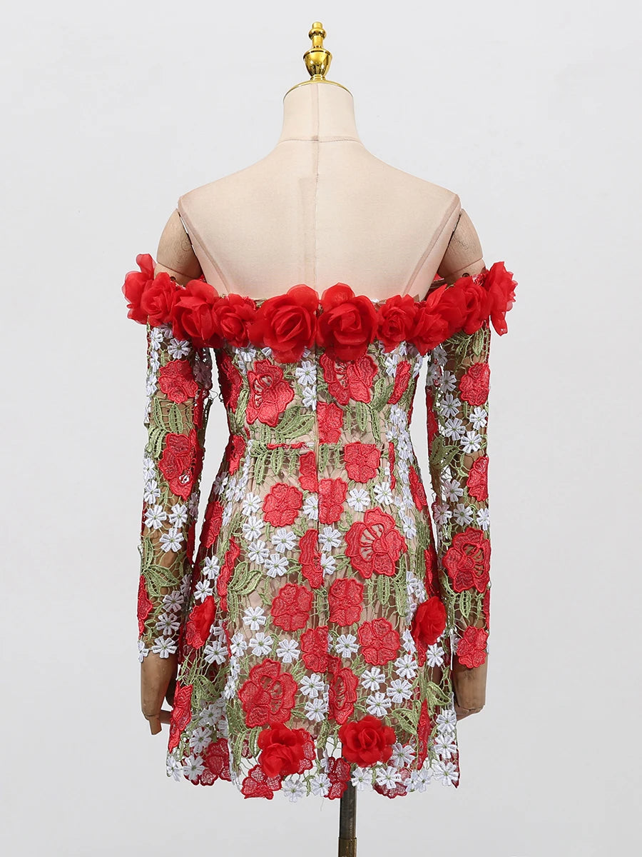 Dress with floral design on a mannequin against a white background
