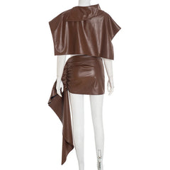 Mannequin wearing a brown leather outfit on a white background