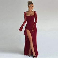 Red lace dress with a high slit on a plain background