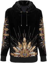 Black velvet hoodie with gold sequin and beaded sunburst embellishment on the front and sleeves.