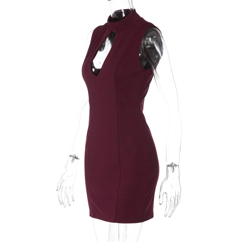 Maroon dress on a mannequin with a white background