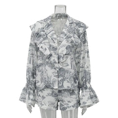 Floral patterned blouse on a mannequin against a white background