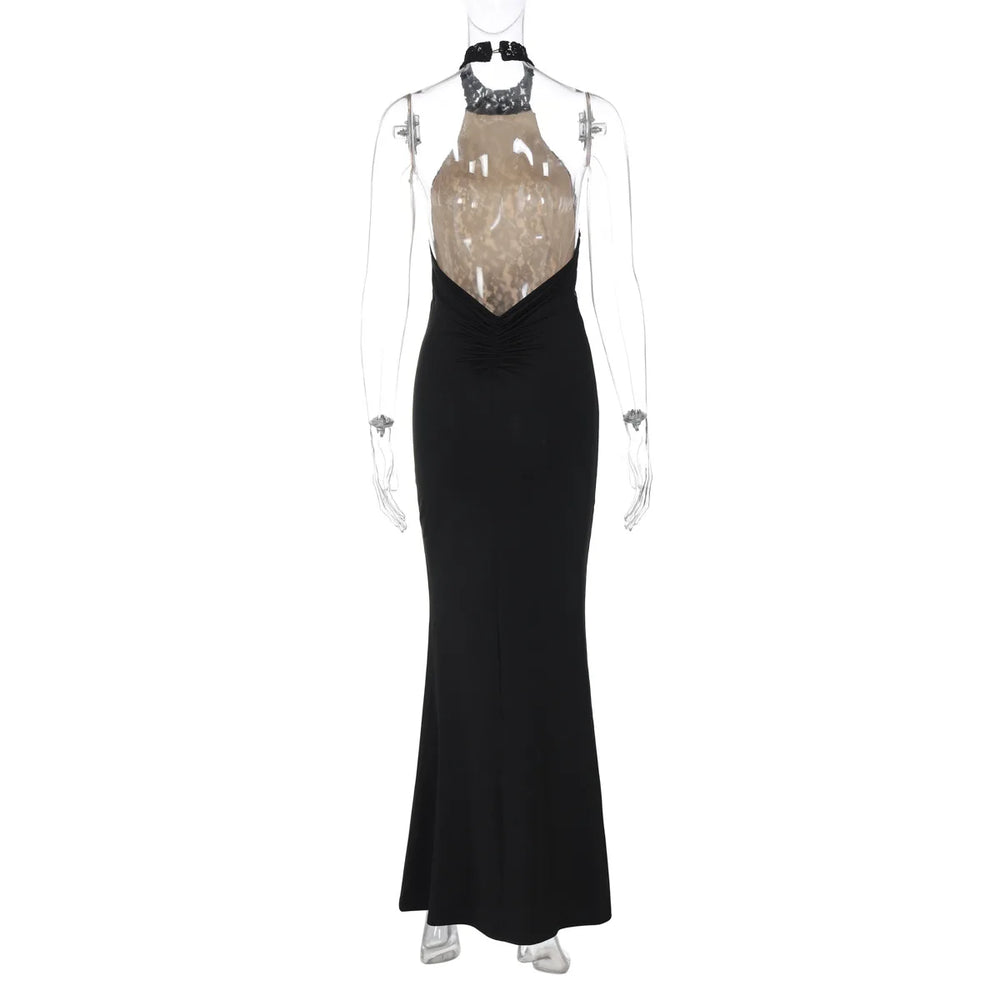 Black evening gown with a beige sequined top on a mannequin against a white background