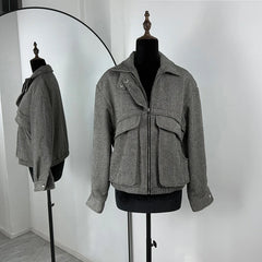 Gray jacket on a mannequin with a white background