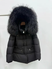 Black puffer jacket with large fur hood on a white background