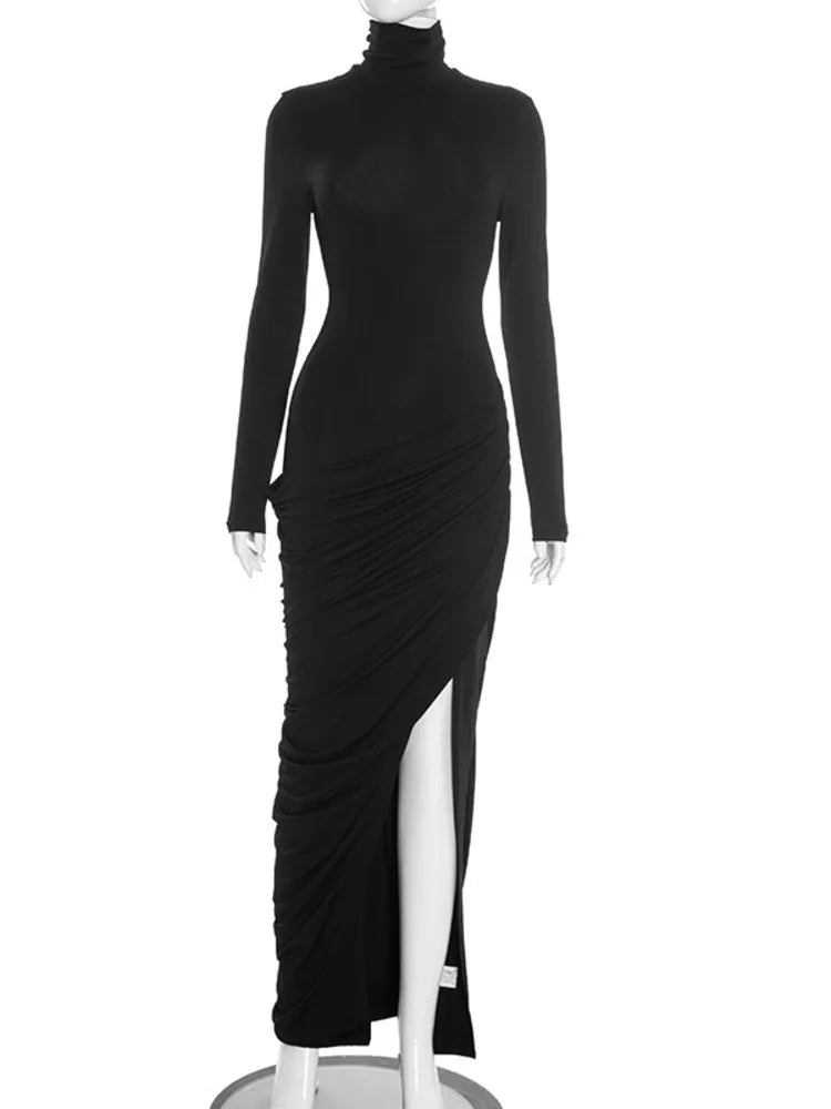 Black long-sleeve dress on a mannequin against a white background