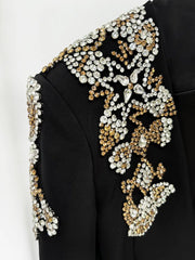 Close-up of embellishments on the blazer shoulder