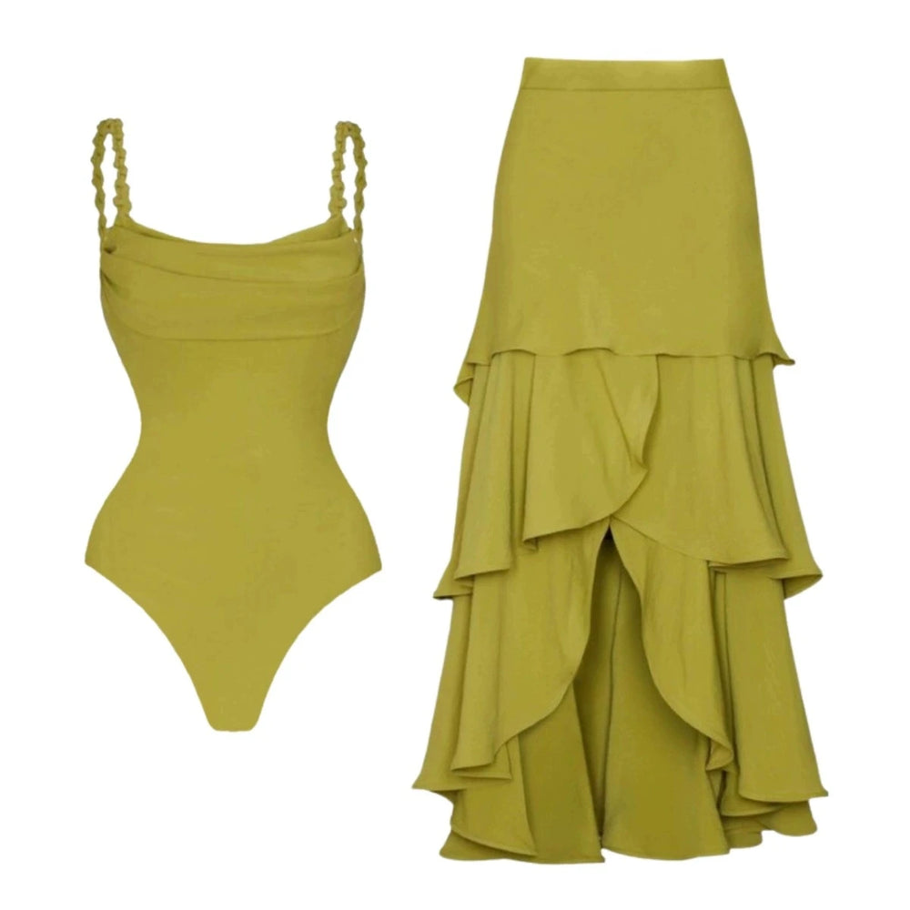 Flat lay of the ruched bodice swimwear and ruffled skirt.