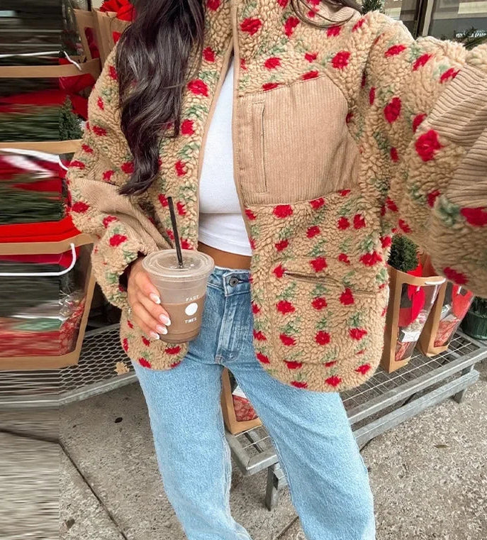 Plush fleece jacket with a vintage floral print and zip-up front.