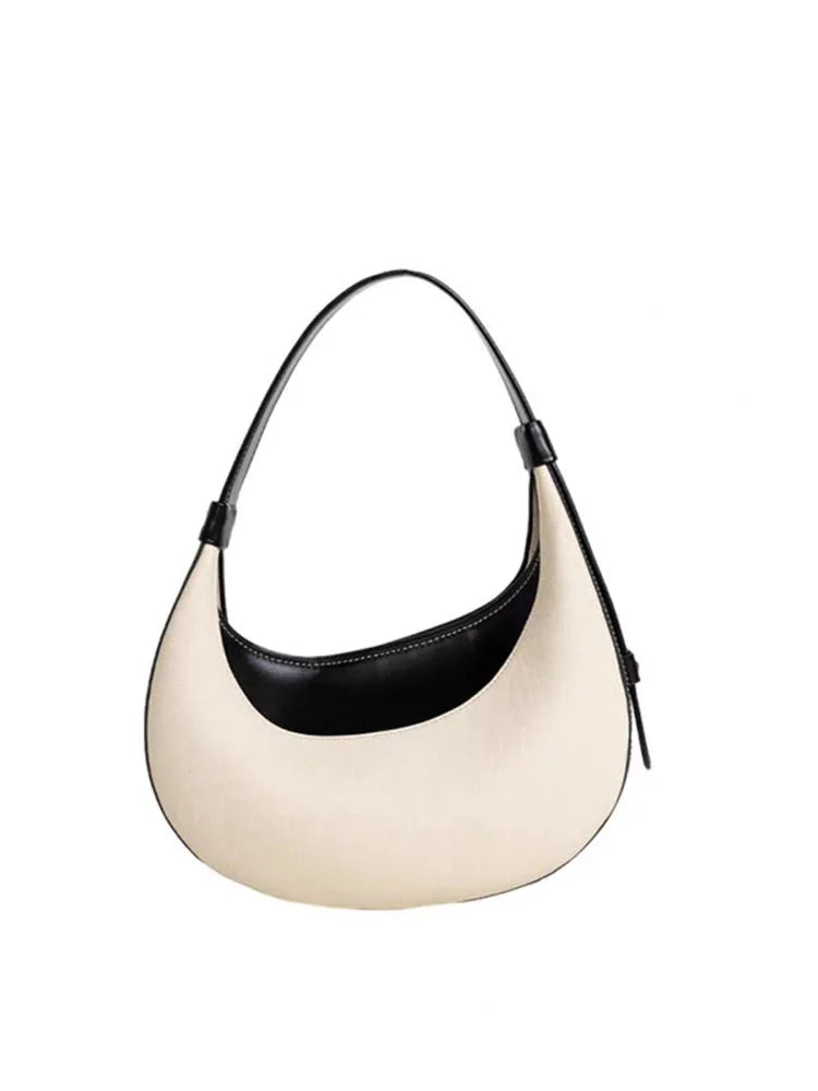 crescent bag underarm style with zip closure