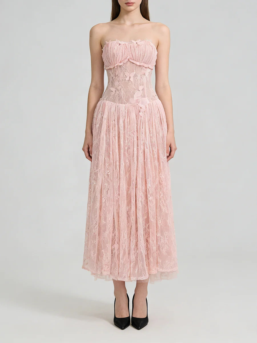 Pink strapless lace dress on a white background