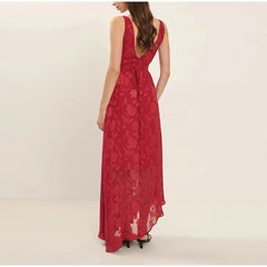 Red floral dress on a model against a plain background