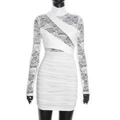 White lace dress on a mannequin against a white background