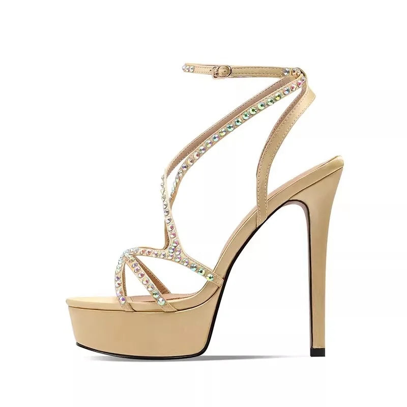 Beige high-heeled sandal with crystal embellishments on a white background