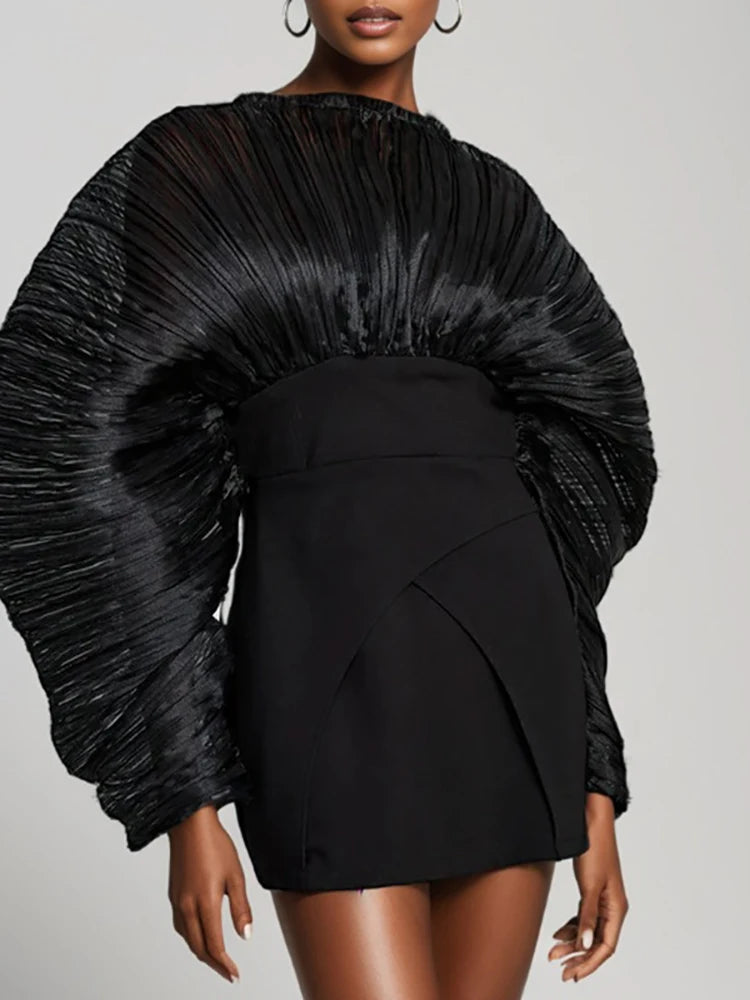 Pleated sleeve mini dress detail on model