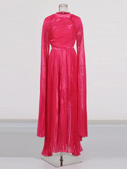 Pink pleated dress on a mannequin against a white background