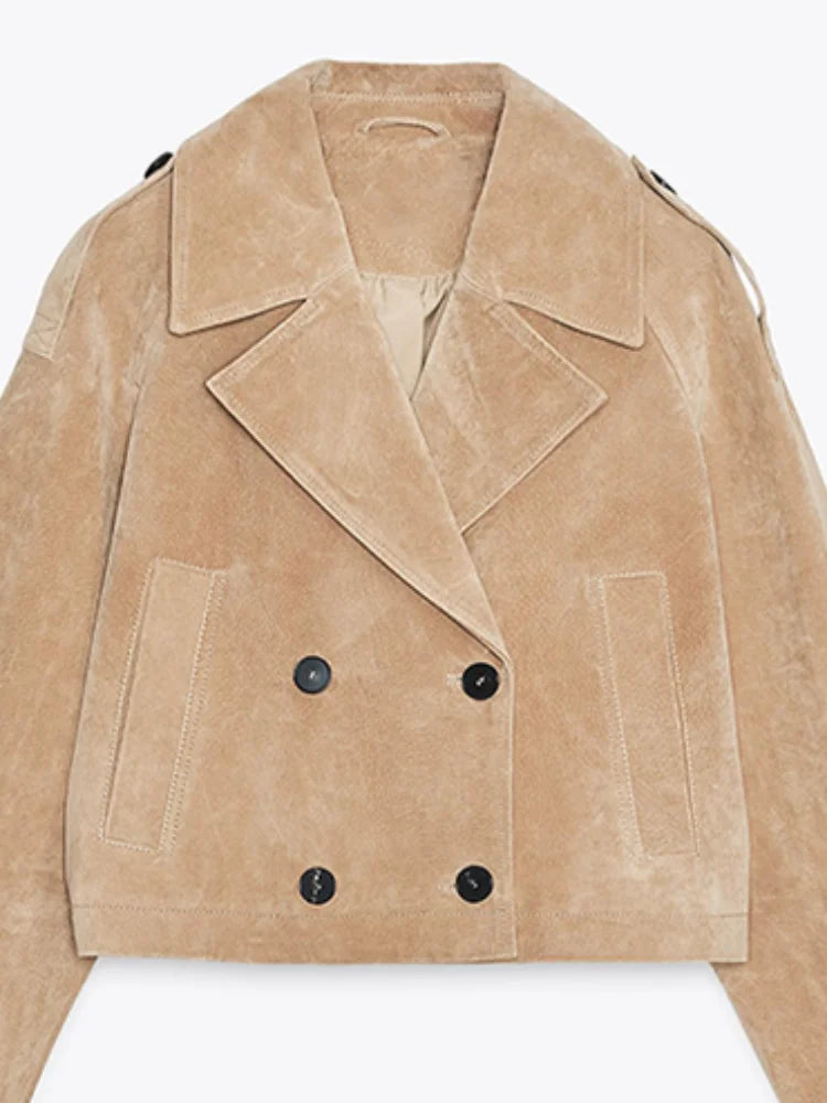 Beige suede jacket with black buttons