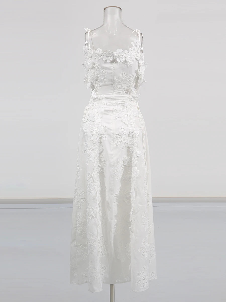 White lace dress on a mannequin against a white background